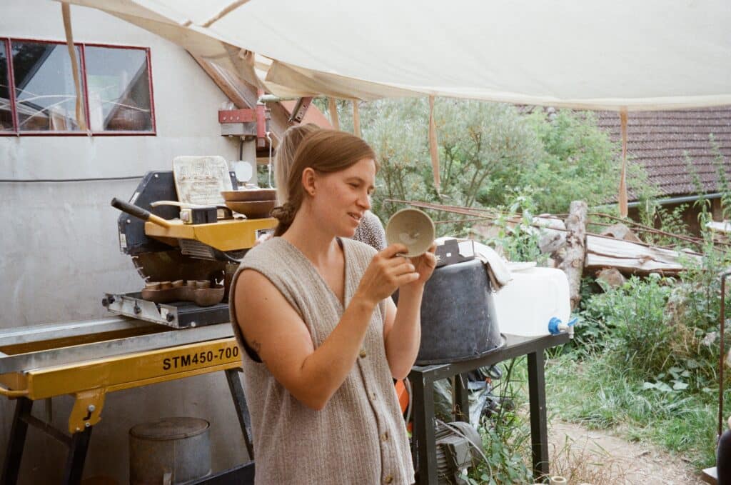 unloading wood-fired kiln